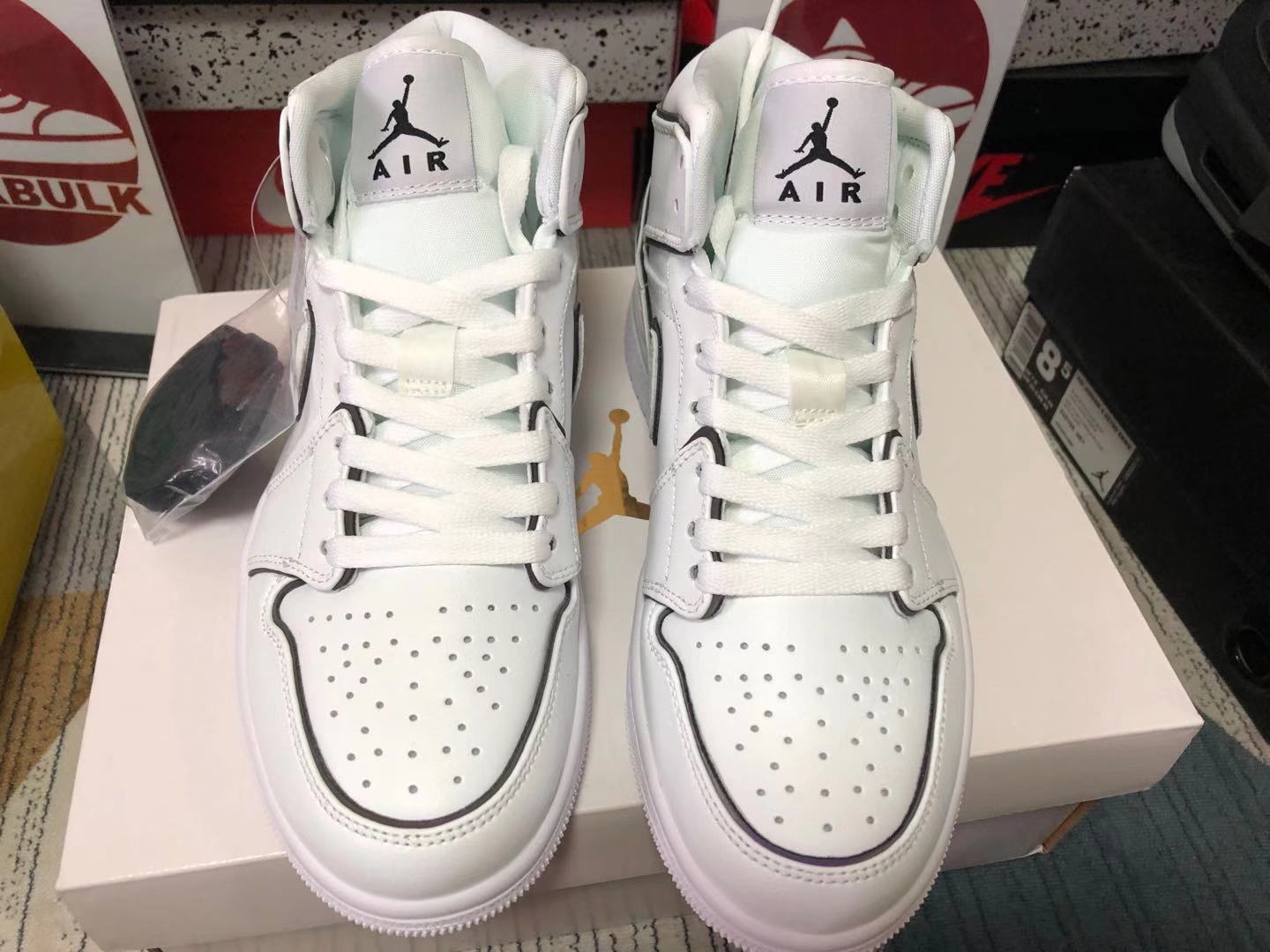 iridescent reflective white jordans